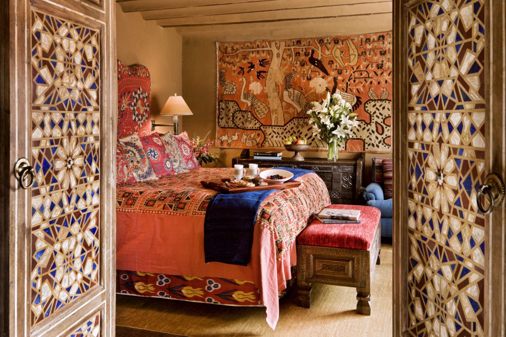 The bedroom in Lapis, one of our suites at The Inn of The Five Graces, a Luxury Boutique Hotel and resort in Downtown Santa Fe, New Mexico.